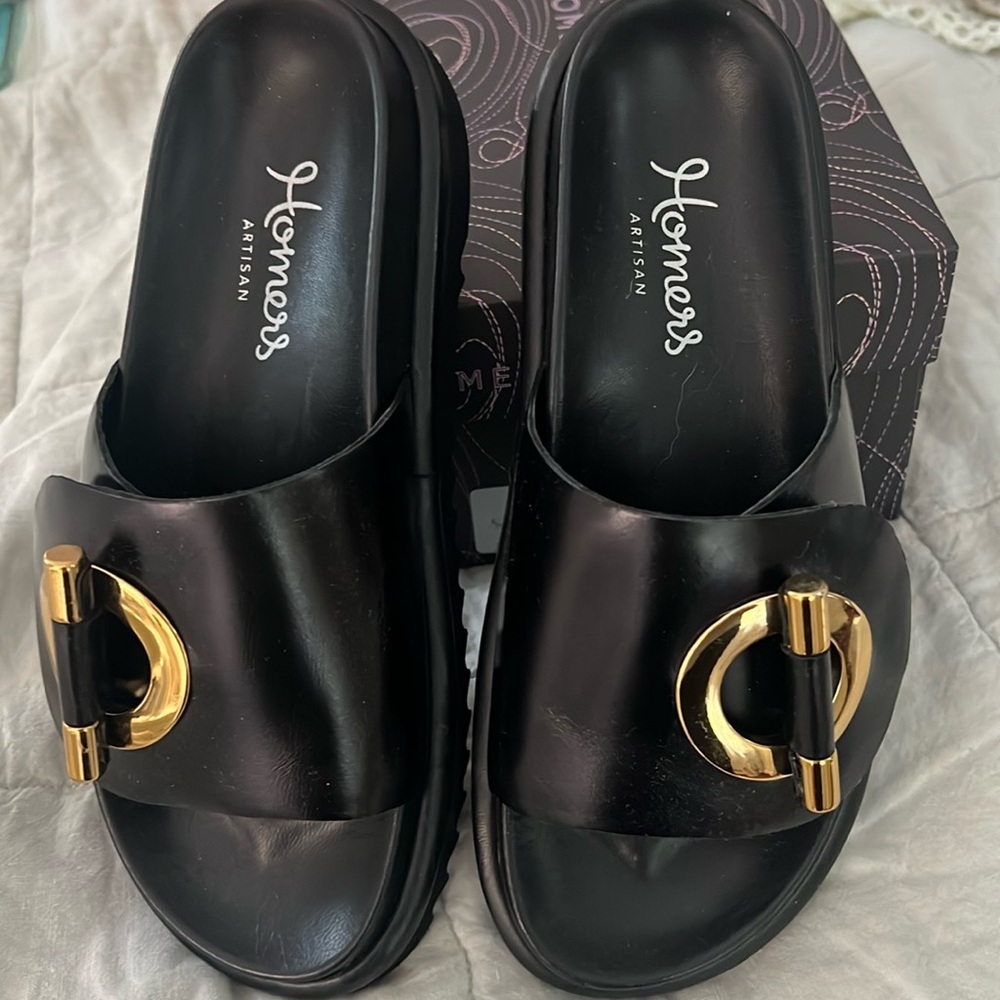 Homers artisan black sandal with gold buckle